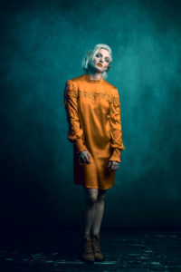 blonde model portfolio shoot on green background by Portrait photographer Preston