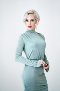 blonde model in green dress by Portrait photographer Preston