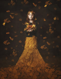 Fine art photography workshop girl in autumn dress with leaves