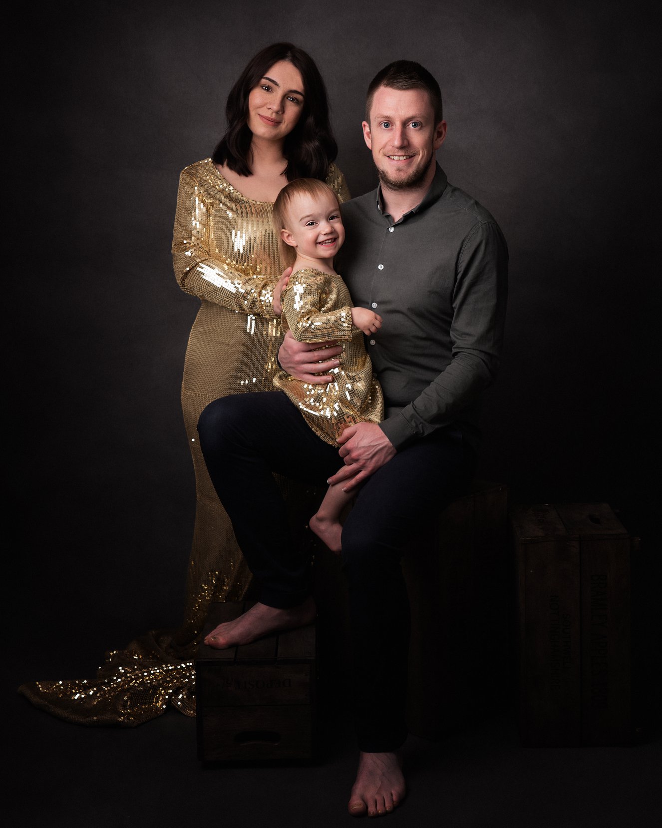 Famiy with young baby by family photographer in preston Lancashire