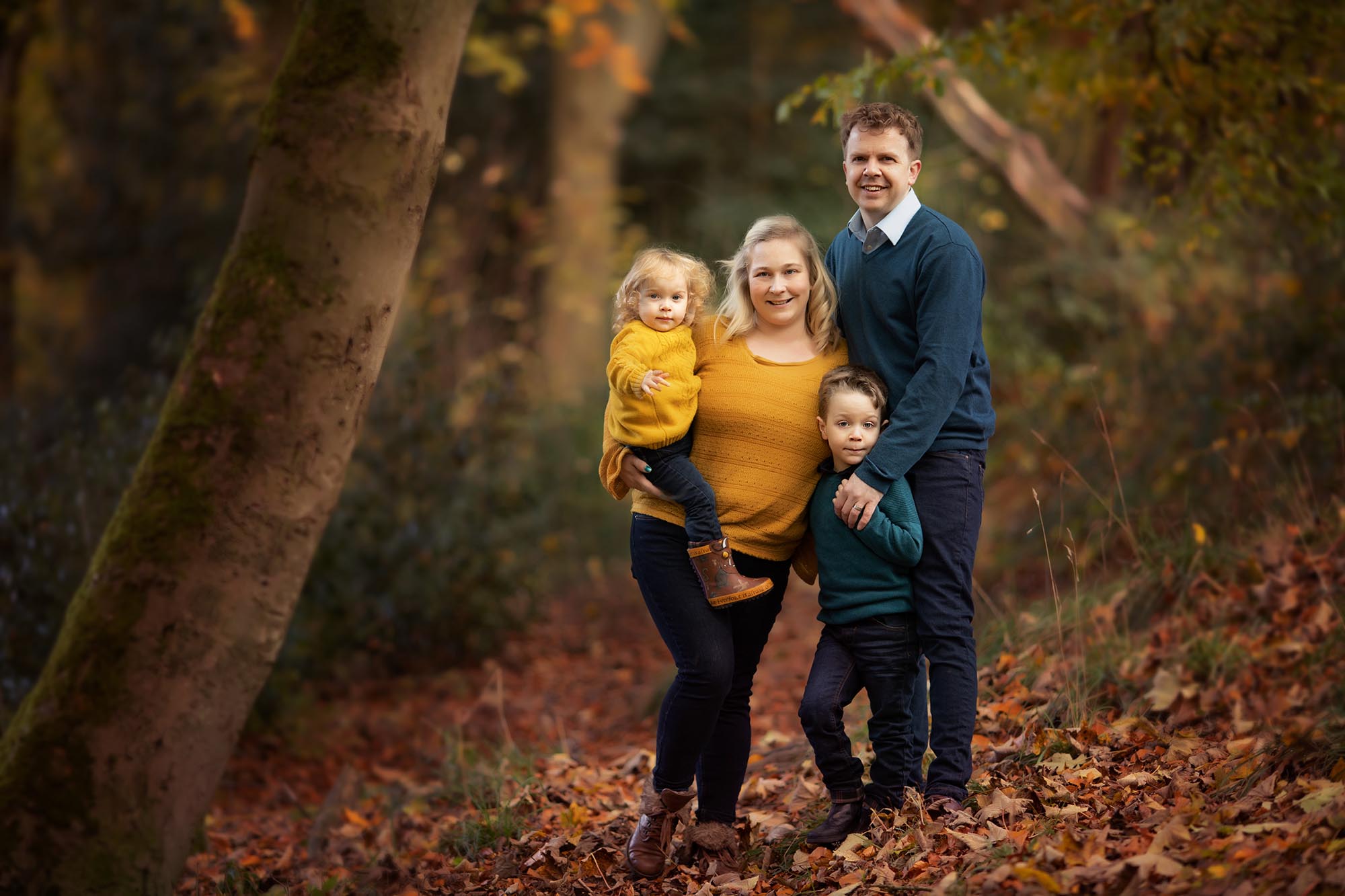 location autumn family portrait in the woods by Family photographer Lancashire